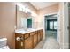 Bathroom featuring double vanity, tile floor and view to the bedroom at 4006 Trinity Ct, Indian Land, SC 29707