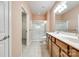 Bathroom with double vanity, tile floor and shower with glass doors at 4006 Trinity Ct, Indian Land, SC 29707