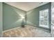 Bright bedroom featuring carpet floors, neutral paint and large window providing natural light at 4006 Trinity Ct, Indian Land, SC 29707