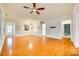 Spacious living room showcasing hardwood floors, with an open view to the kitchen at 4006 Trinity Ct, Indian Land, SC 29707