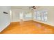 Bright living room with hardwood floors and large windows for natural light at 4006 Trinity Ct, Indian Land, SC 29707