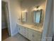 Modern bathroom featuring double sinks with contemporary lighting and vanities at 4356 Morning Mist Dr # 22, Sherrills Ford, NC 28673