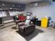 Finished basement with recliner, storage, and workshop area at 703 Margate Ave, Kannapolis, NC 28081