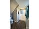 Small bathroom with shower, toilet, and grab bar at 703 Margate Ave, Kannapolis, NC 28081