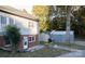 House exterior featuring a two-tone finish, detached shed, and landscaping at 703 Margate Ave, Kannapolis, NC 28081