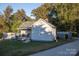 Gray siding house with a porch and large yard at 703 Margate Ave, Kannapolis, NC 28081