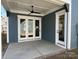 Covered patio with French doors and brick flooring at 714 Barrel Aly, Fort Mill, SC 29715