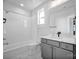 Clean bathroom with tub-shower combo, white subway tile, and modern vanity with marble countertop at 714 Barrel Aly, Fort Mill, SC 29715