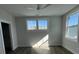 Bright bedroom with wood floors, ceiling fan, and large windows at 714 Barrel Aly, Fort Mill, SC 29715