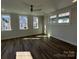 Well-lit bedroom with hardwood floors and multiple windows at 714 Barrel Aly, Fort Mill, SC 29715