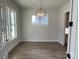 Bright dining room featuring hardwood floors and a modern light fixture at 714 Barrel Aly, Fort Mill, SC 29715