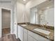 Bathroom with double vanity and granite countertop at 117 Dorian Pl, Troutman, NC 28166