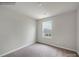 Bright bedroom with window and carpet floors at 117 Dorian Pl, Troutman, NC 28166