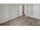 Spacious bedroom with carpeted floor and doors at 117 Dorian Pl, Troutman, NC 28166