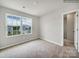 Bedroom with carpet and a view from the window at 117 Dorian Pl, Troutman, NC 28166