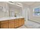 Elegant bathroom with double vanity and tiled floors at 1360 Barnett Woods, Fort Mill, SC 29708