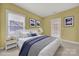 Virtually staged bedroom with a queen-size bed and access to a balcony at 1360 Barnett Woods, Fort Mill, SC 29708