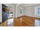 Bright dining room with hardwood floors and a view of the front yard at 1360 Barnett Woods, Fort Mill, SC 29708