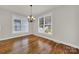 Spacious dining room with hardwood floors and large windows at 1360 Barnett Woods, Fort Mill, SC 29708