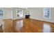 Living room featuring hardwood floors and a corner fireplace at 1360 Barnett Woods, Fort Mill, SC 29708