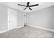 Bedroom features include neutral carpet and a large closet at 150 Roxie Ln, Belmont, NC 28012