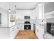 Contemporary kitchen with white cabinetry, stainless steel appliances, and granite counters at 150 Roxie Ln, Belmont, NC 28012