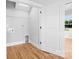 Laundry room with hardwood floors and a wire shelf at 150 Roxie Ln, Belmont, NC 28012