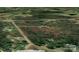 Overhead aerial view of the property location marked with a red outline in a densely wooded neighborhood at 1062 Full Count Ln, Lancaster, SC 29720