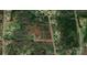 Aerial view of the land parcel with red outlines on a heavily wooded lot, showing location and surrounding area at 1062 Full Count Ln, Lancaster, SC 29720