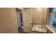Bathroom with vanity featuring solid surface countertop with adjacent door at 1062 Full Count Ln, Lancaster, SC 29720