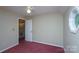 A bedroom featuring a ceiling fan and a doorway into a stairwell at 1062 Full Count Ln, Lancaster, SC 29720
