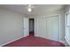 A bedroom featuring a ceiling fan, window, and closet at 1062 Full Count Ln, Lancaster, SC 29720