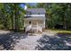 Charming two-story home with a welcoming front porch and steps at 1062 Full Count Ln, Lancaster, SC 29720