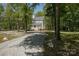 Charming two-story home with a long gravel driveway in wooded surroundings at 1062 Full Count Ln, Lancaster, SC 29720