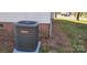 View showcases the home's modern Goodman HVAC system, installed on a concrete pad at 1062 Full Count Ln, Lancaster, SC 29720
