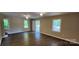 Spacious living room with ample natural light and hardwood floors at 1062 Full Count Ln, Lancaster, SC 29720