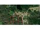Aerial view of large wooded lot surrounded by mature trees at 1216 Stallion Ln, Lancaster, SC 29720