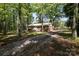 Charming brick home on a large lot surrounded by mature trees at 1216 Stallion Ln, Lancaster, SC 29720