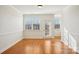 Bright dining room with hardwood floors and crown molding at 127 High Ridge Rd, Mooresville, NC 28117