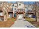 Tan 3-story townhome with multiple balconies and attached garage at 127 High Ridge Rd, Mooresville, NC 28117