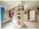 Walk-in closet with custom shelving and ample storage space at 1919 Kensal Ct, Charlotte, NC 28211