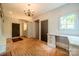 Hallway with brick floors and a built in desk at 1919 Kensal Ct, Charlotte, NC 28211