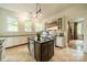 Modern kitchen with granite countertops, stainless steel appliances, and center island at 1919 Kensal Ct, Charlotte, NC 28211