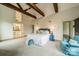 Main bedroom featuring vaulted ceiling, exposed beams, and a connecting bathroom at 1919 Kensal Ct, Charlotte, NC 28211