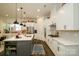 Spacious kitchen featuring white cabinetry and a gas cooktop at 216 Portrait Way, Indian Trail, NC 28079