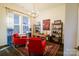 Bright office space with red chairs and built-in shelving at 216 Portrait Way, Indian Trail, NC 28079