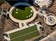 Aerial view of community recreation area with bocce ball and putting green at 216 Portrait Way, Indian Trail, NC 28079