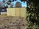 Newly installed wood fence providing privacy for the property's backyard at 305 N White St, Lancaster, SC 29720