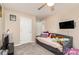 Cozy bedroom with a daybed, TV, and soft lighting. Great space for relaxing or entertaining guests at 4707 Hannah Dr, Rock Hill, SC 29732