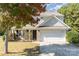 Charming two-story home with a brick-accented facade and attached two-car garage at 4707 Hannah Dr, Rock Hill, SC 29732